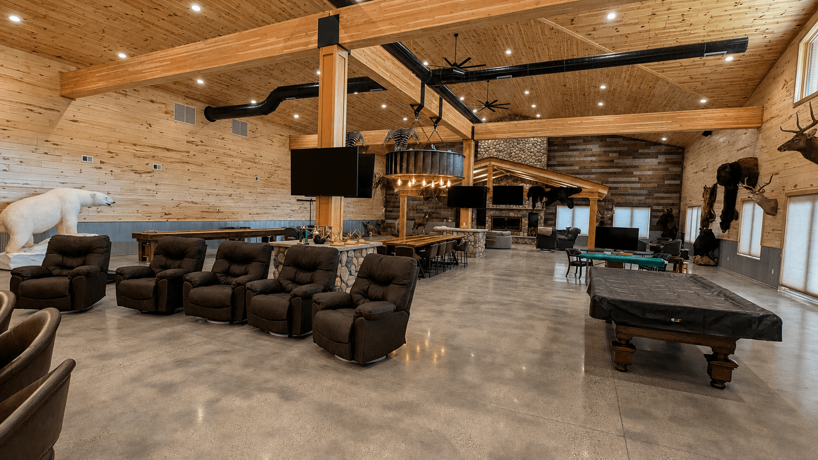 Expansive Davison cabin entertainment space with multiple integrated displays