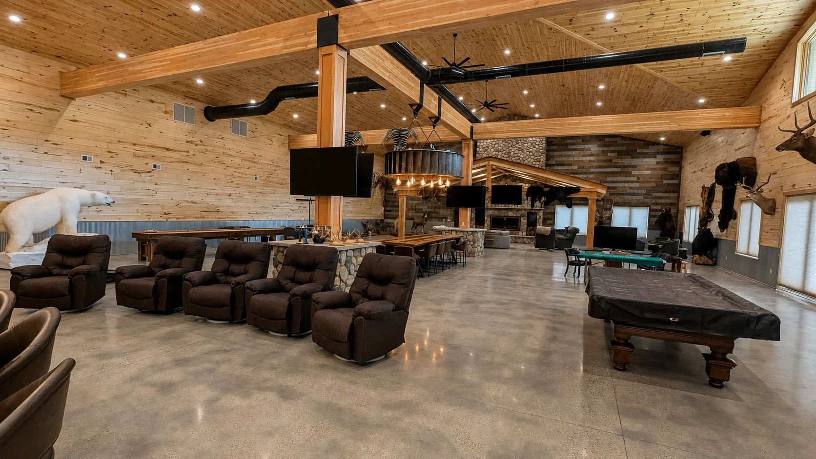 Expansive Davison cabin entertainment space with multiple integrated displays