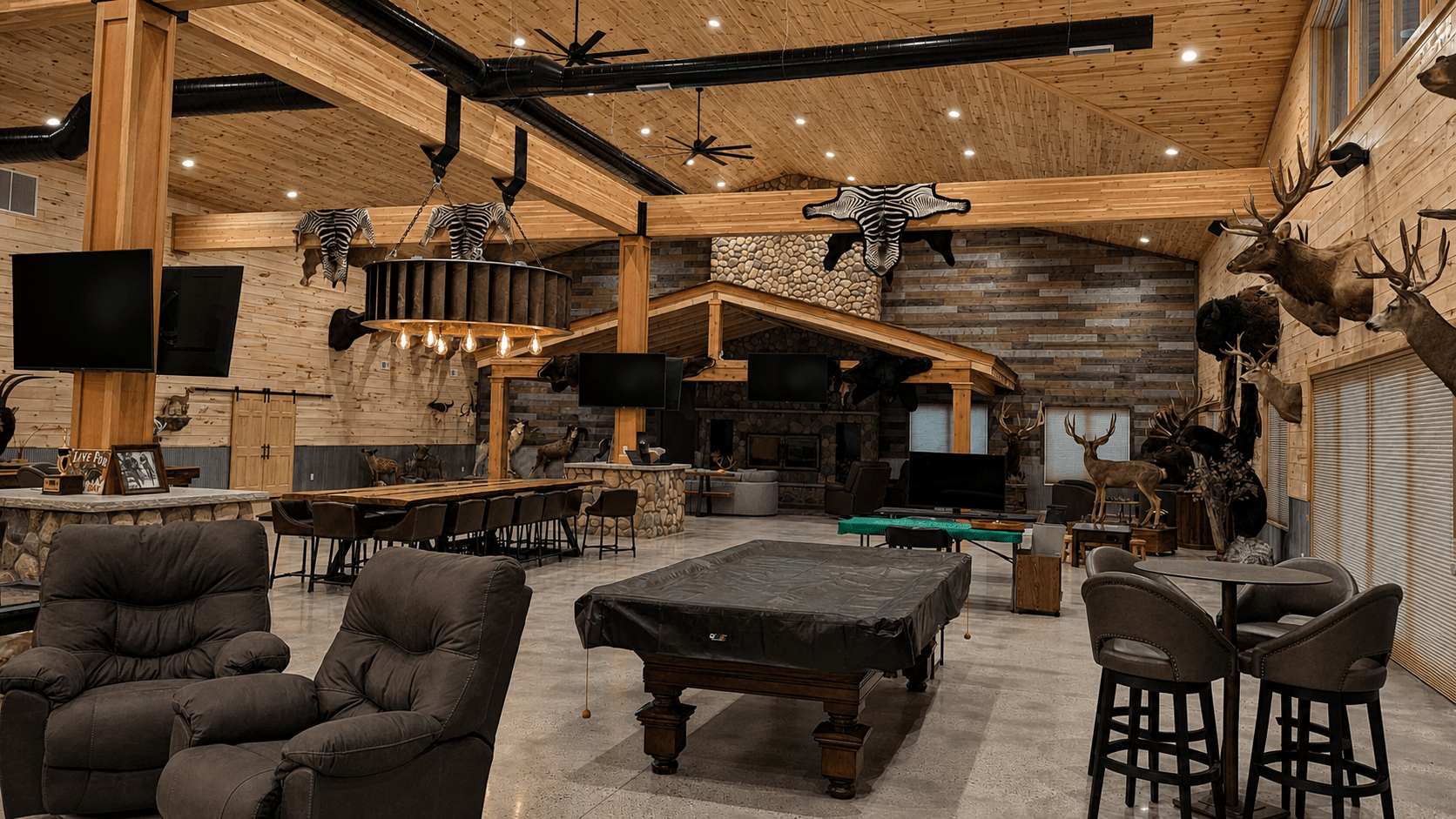 Davison cabin main room with multiple integrated entertainment displays