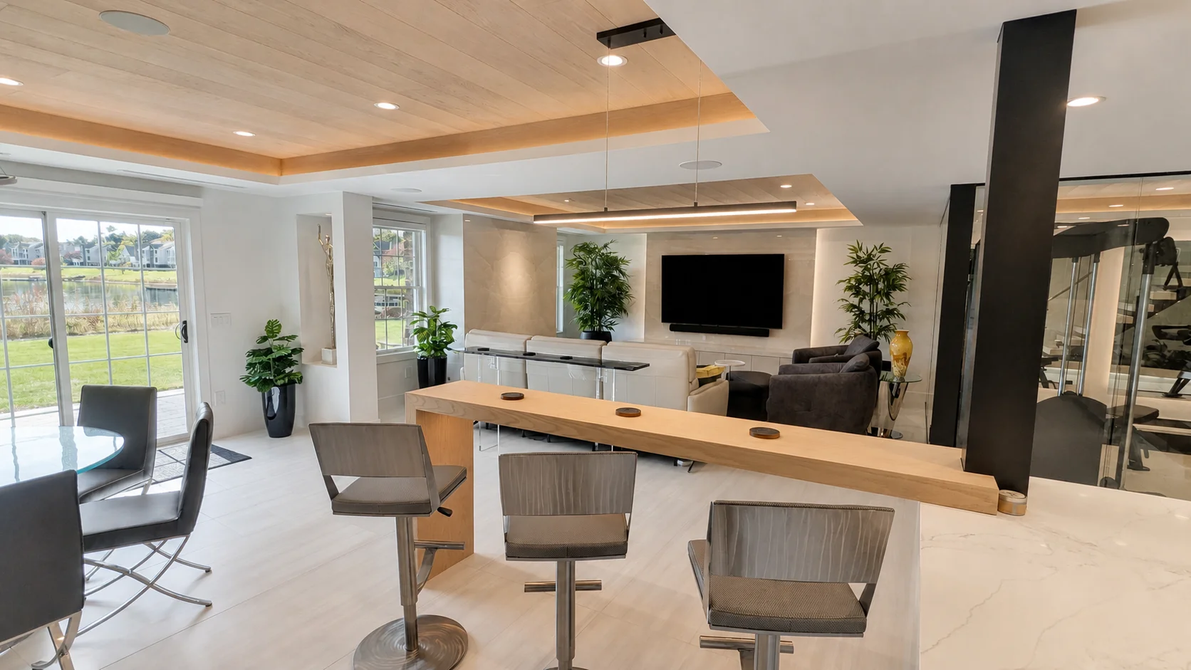 Contemporary Novi living area with an integrated display and discreet ceiling speakers